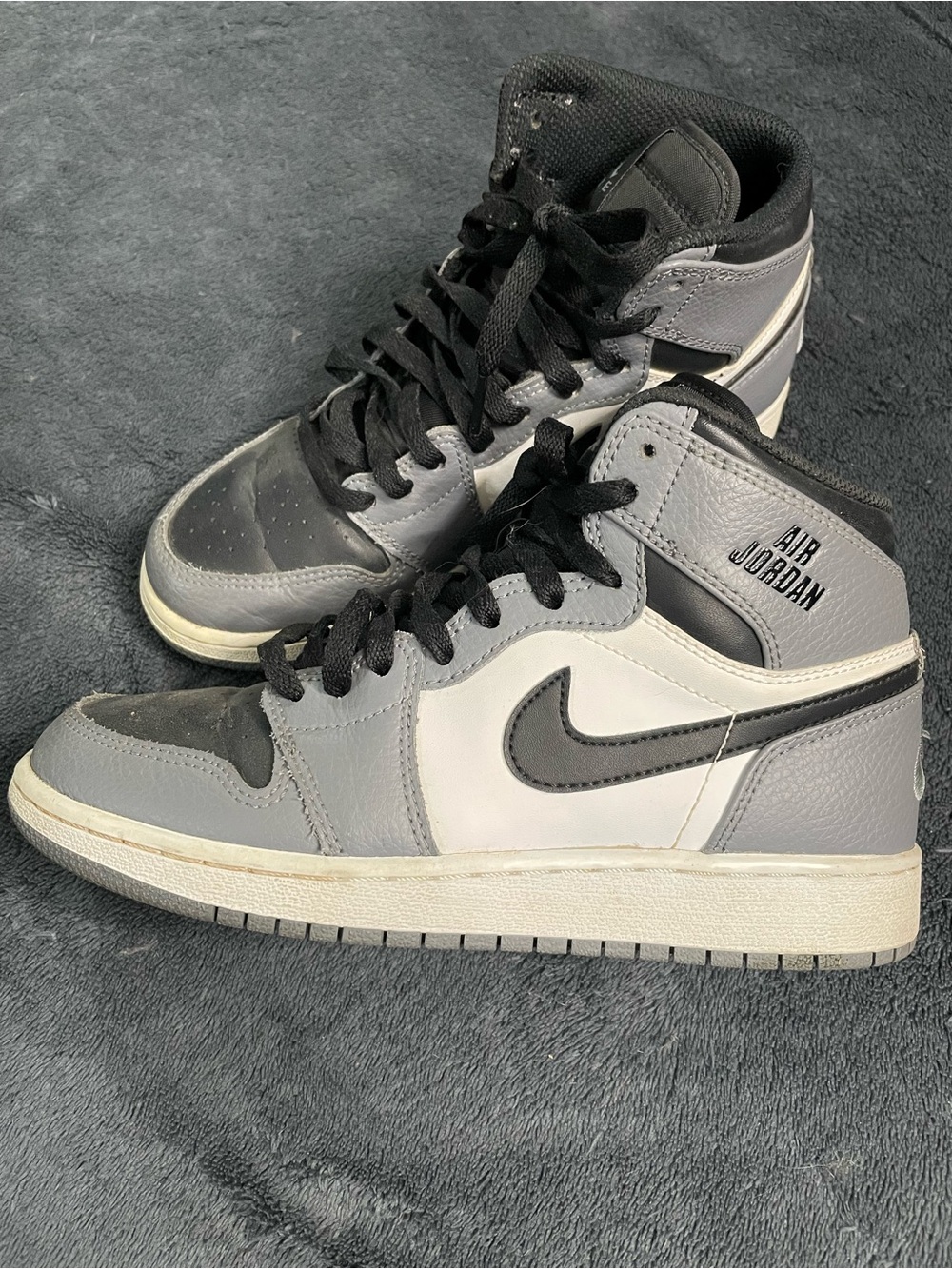 Jordan Black and White High-Top Sneakers